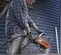 Orange, black and silver HUSQVARNA Air Concrete Saw, 12-14 in.