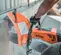 Orange, black and gray STIHL Cut-Off Saw, 16 ft., Gas Powered