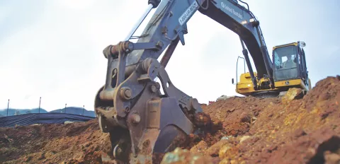 excavator digging trench
