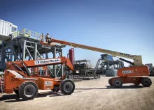 jobsite with boom lifts and forklifts 